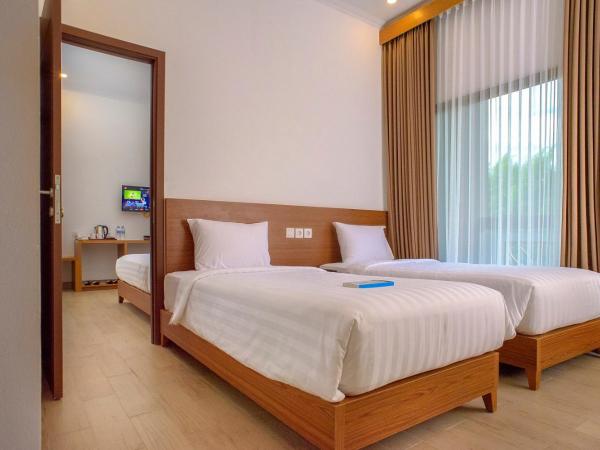Java Village Resort by HOMEE Yogyakarta : photo 4 de la chambre chambre lits jumeaux deluxe