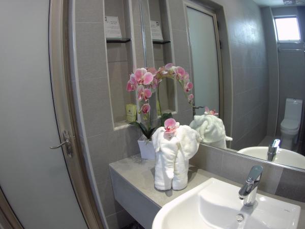 Meriton Inn : photo 2 de la chambre chambre lits jumeaux deluxe