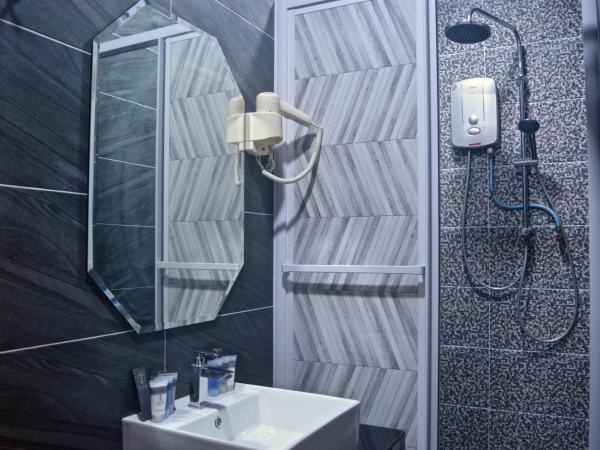 Iconic Suites & Pods Hotel : photo 6 de la chambre chambre triple exécutive