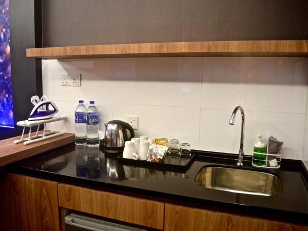 Iconic Suites & Pods Hotel : photo 2 de la chambre suite 3 chambres