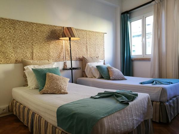 Discovery Apartment Expo : photo 6 de la chambre chambre lits jumeaux avec salle de bains privative