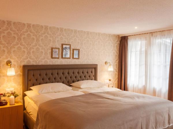 Hotel Walliserhof Zermatt : photo 2 de la chambre suite familiale