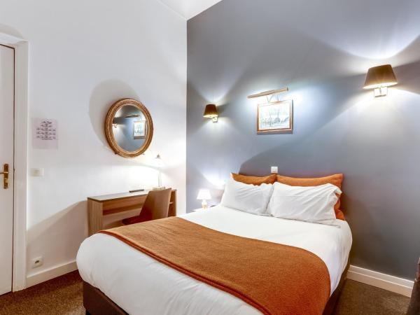 Hotel Opera Maintenon : photo 2 de la chambre chambre simple avec un grand lit