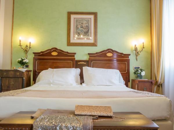 Due Torri Hotel : photo 4 de la chambre chambre deluxe double ou lits jumeaux