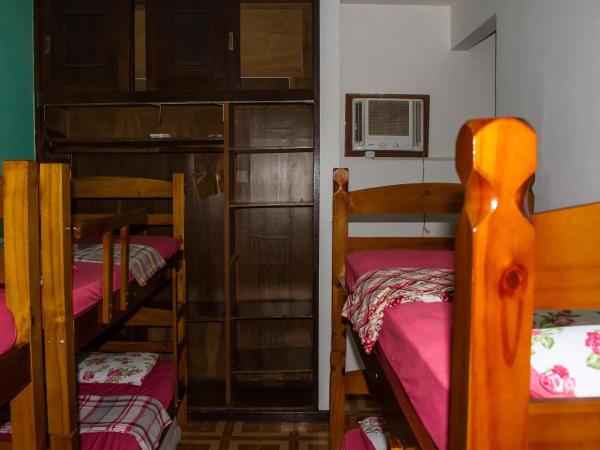 Rio Surf House Hostel e Pousada : photo 2 de la chambre lit simple dans dortoir de 8 lits avec climatisation