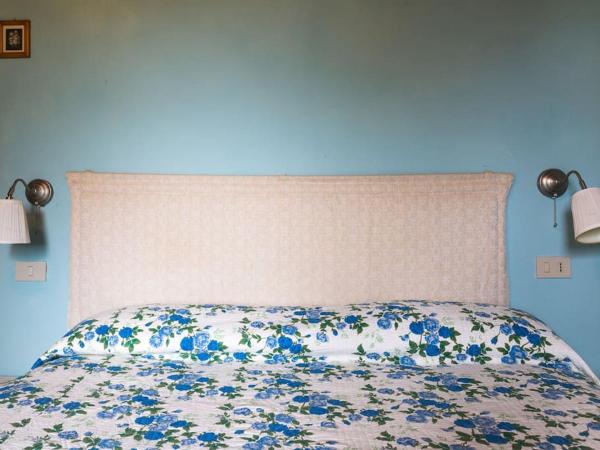 Agriturismo Il Poggio degli Scoiattoli : photo 4 de la chambre chambre familiale avec salle de bains privative