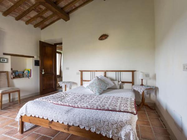 Agriturismo Il Poggio degli Scoiattoli : photo 9 de la chambre chambre familiale - vue sur jardin
