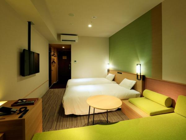 THE SINGULARI HOTEL & SKYSPA at UNIVERSAL STUDIOS JAPAN : photo 5 de la chambre chambre lits jumeaux standard avec canapé-lit - non-fumeurs - vue sur fleuve