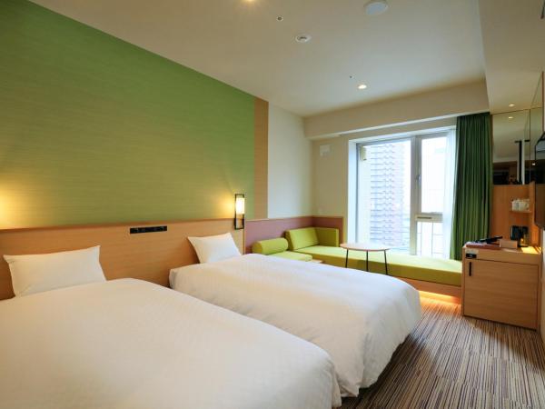 THE SINGULARI HOTEL & SKYSPA at UNIVERSAL STUDIOS JAPAN : photo 1 de la chambre chambre lits jumeaux standard avec canapé-lit - Étage supérieur - non-fumeurs