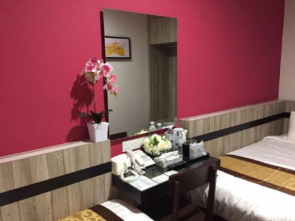 Meriton Inn : photo 5 de la chambre chambre lits jumeaux Économique