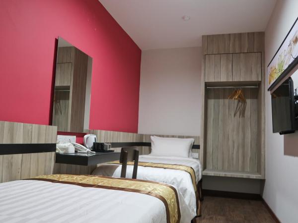 Meriton Inn : photo 1 de la chambre chambre lits jumeaux Économique