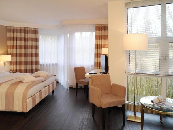 relexa Waldhotel Schatten Stuttgart : photo 6 de la chambre chambre double deluxe