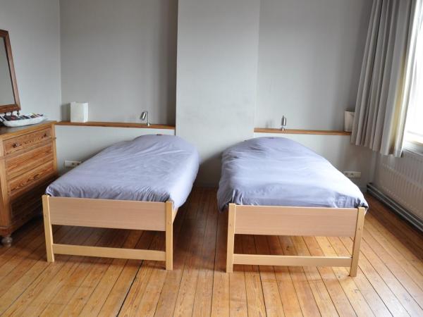 W'allons nous dormir : photo 1 de la chambre chambre double ou lits jumeaux - vue sur ville