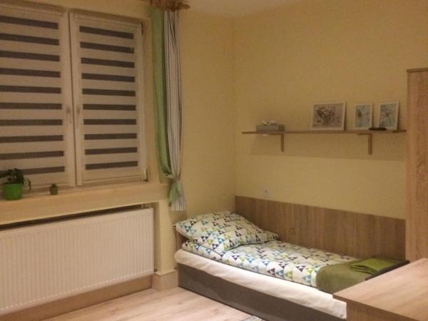 Kathia Pokoje Gościnne : photo 7 de la chambre chambre triple avec salle de bains privative