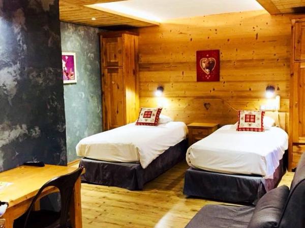 Hotel Alpina : photo 4 de la chambre chambre lits jumeaux