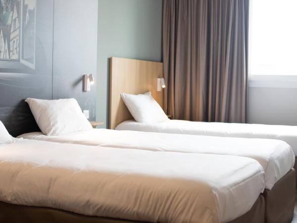 B&B HOTEL CHARTRES Oceane : photo 1 de la chambre chambre triple classique