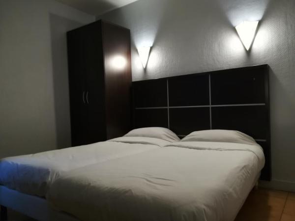 Hotel du Globe 18 : photo 1 de la chambre chambre lits jumeaux