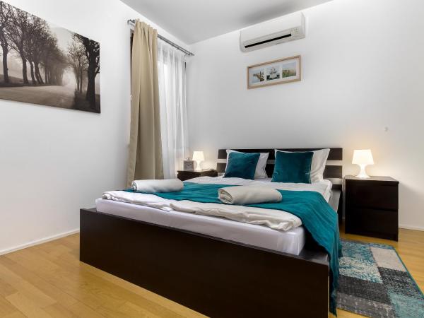 Quality Point Apartments : photo 2 de la chambre appartement 2 chambres avec balcon