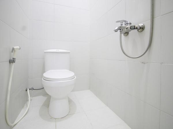 RedDoorz Plus near STIE YKPN : photo 1 de la chambre chambre deluxe