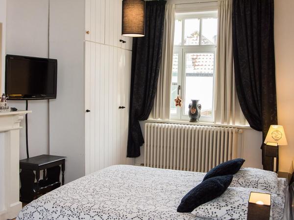 Huis Sint-Andriescruyse : photo 1 de la chambre chambre double deluxe avec baignoire