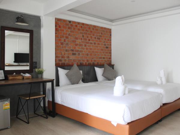 The Old City Wall Inn : photo 5 de la chambre chambre lits jumeaux - vue sur jardin