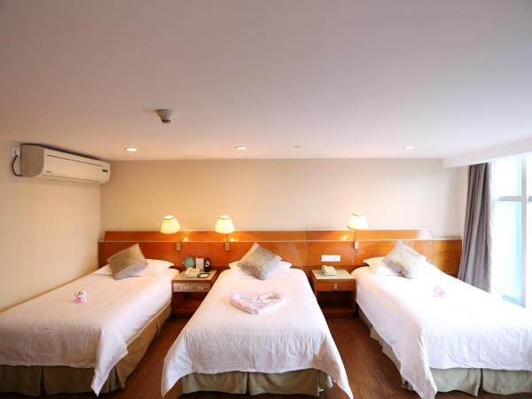 Yihe Hotel Ouzhuang : photo 1 de la chambre chambre triple deluxe
