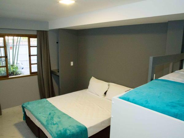 REF House Barra Da Tijuca : photo 1 de la chambre suite - vue sur jardin