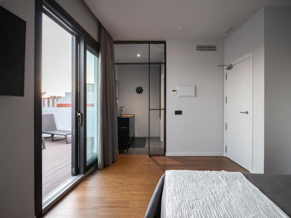 Welldone Antiquarium : photo 3 de la chambre appartement de grand standing avec terrasse