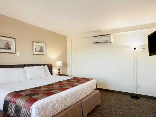 Days Inn by Wyndham Montreal East : photo 4 de la chambre chambre lit king-size - non-fumeurs