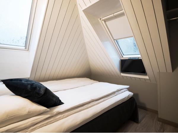 Home Again Apartments Nygata 1 : photo 3 de la chambre appartement avec balcon