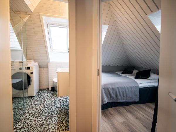 Home Again Apartments Nygata 1 : photo 1 de la chambre appartement 2 chambres