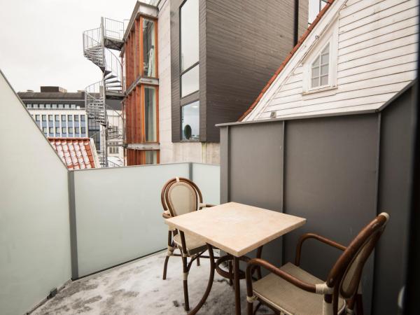 Home Again Apartments Nygata 1 : photo 3 de la chambre appartement 2 chambres