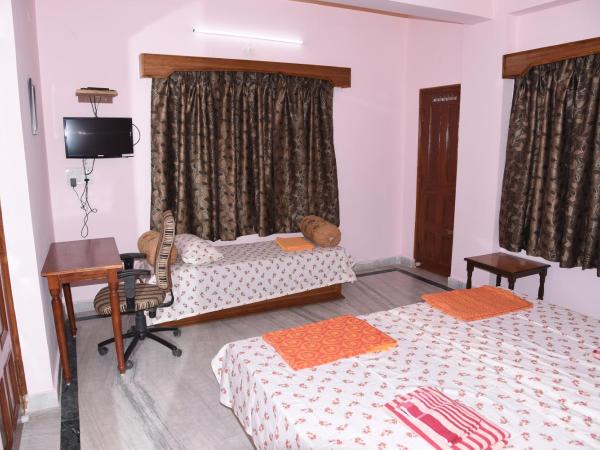 anjani mansion : photo 5 de la chambre chambre triple avec salle de bains