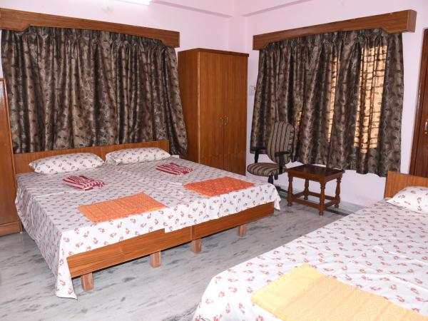 anjani mansion : photo 7 de la chambre chambre triple avec salle de bains