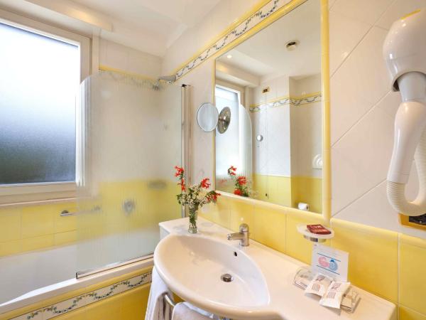 Hotel Continental : photo 2 de la chambre chambre familiale (2 adultes et 2 enfants)