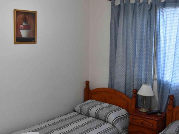 Residencial El Hogar : photo 3 de la chambre chambre lits jumeaux