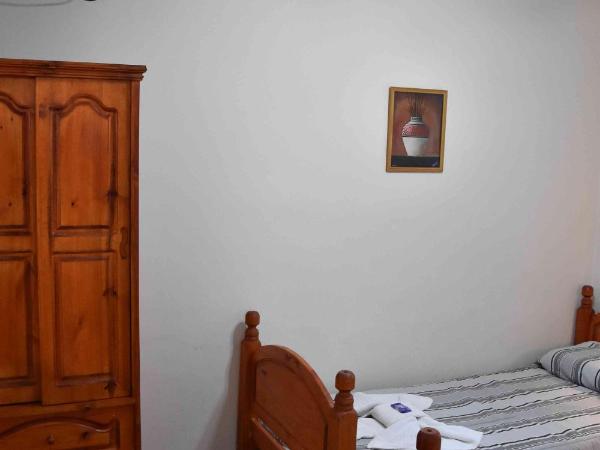Residencial El Hogar : photo 4 de la chambre chambre lits jumeaux