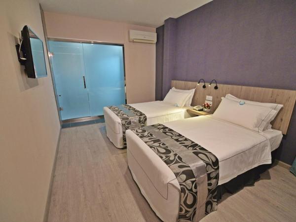 Diamond Inn : photo 1 de la chambre chambre lits jumeaux sans fenêtre