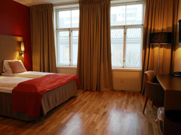 City Living Schøller Hotel : photo 2 de la chambre chambre double ou lits jumeaux