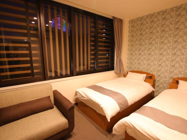 Guest House Rice Chikko : photo 4 de la chambre triple room with shared bathroom and city view 205