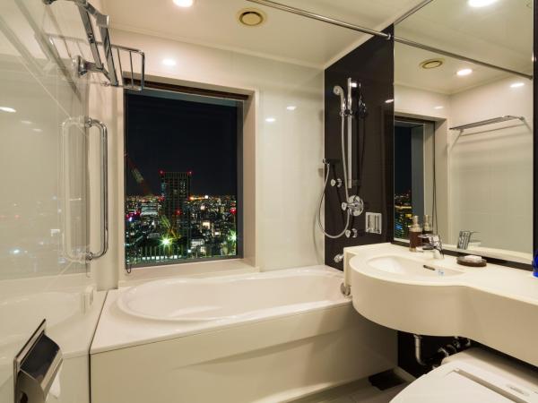 Hotel Metropolitan Tokyo Marunouchi : photo 4 de la chambre chambre lit king-size d'angle non-fumeurs - vue sur ville