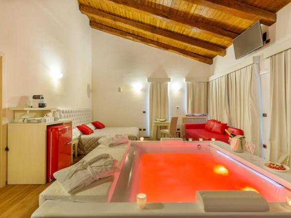 Hotel Sa Cheya Relais & Spa : photo 8 de la chambre suite lit king-size avec baignoire spa