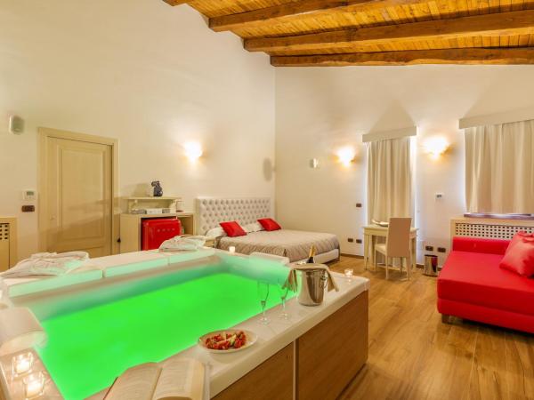 Hotel Sa Cheya Relais & Spa : photo 7 de la chambre suite lit king-size avec baignoire spa