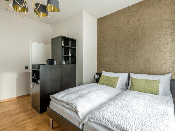 Boutique Hotel KARL : photo 3 de la chambre chambre quadruple supérieure avec balcon - vue sur rivière