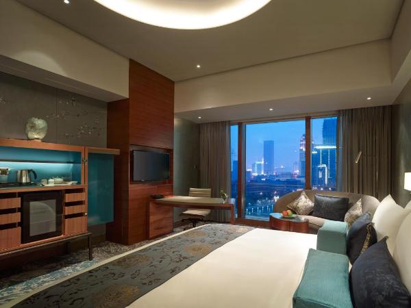 Shangri-La Tianjin : photo 1 de la chambre chambre lit king-size de luxe - vue sur rivière