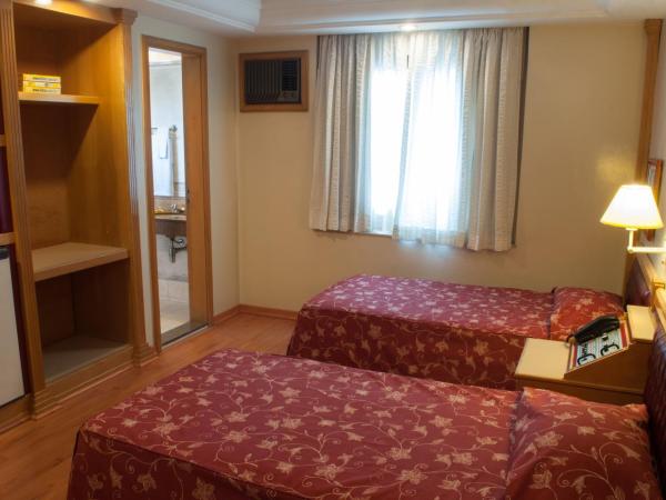 King Hotel : photo 5 de la chambre chambre lits jumeaux avec salle de bains