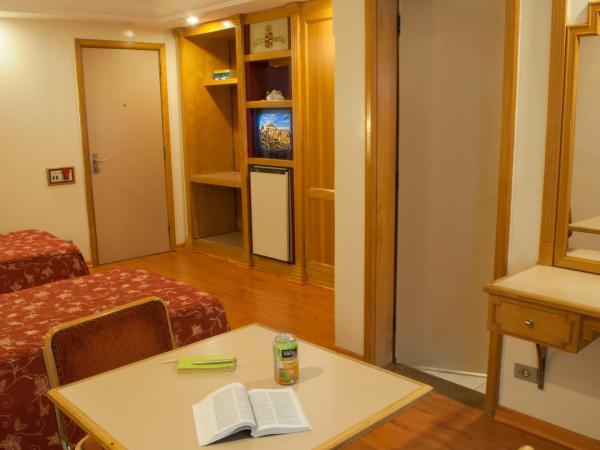 King Hotel : photo 3 de la chambre chambre lits jumeaux avec salle de bains