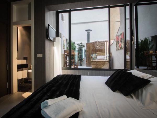 Cosy Rooms Embajador : photo 3 de la chambre chambre triple