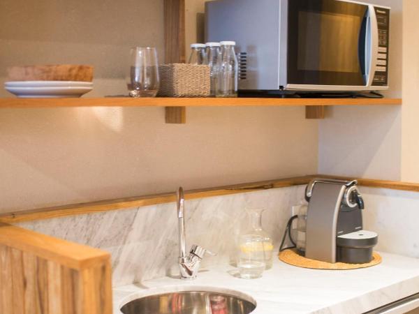 AQ Tailored Suites : photo 9 de la chambre suite deluxe avec lit king-size