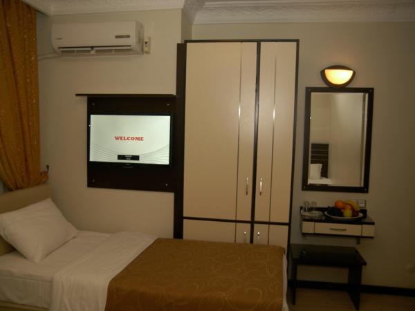 Merdan Hotel : photo 8 de la chambre chambre quadruple Économique